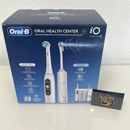Oral-B Oral Health  Munddusche , 2 Ersatzdüsen plus iO Series 6 Elektrische Zahnbürste/Electric Toothbrush, 2 Aufsteckbürsten, 5 Modi für Zahnpflege, weiß